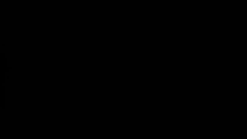 Super Slow Motion Shot of Fireball Transition Isolated on Black Background at 1000fps.
