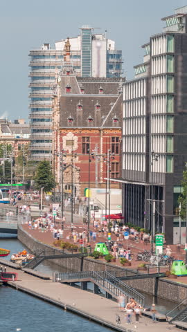 Aerial view of a Chinese restaurant in the form of pagoda on the water, set against the backdrop of historical city center buildings and modern architecture timelapse. Amsterdam, Netherlands
