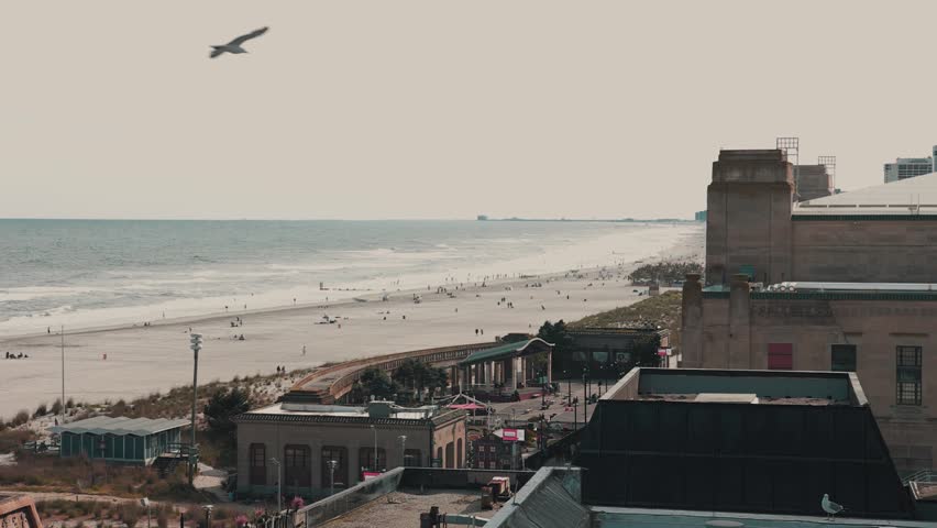 A crowded Atlantic City beach on a sunny day in New Jersey.