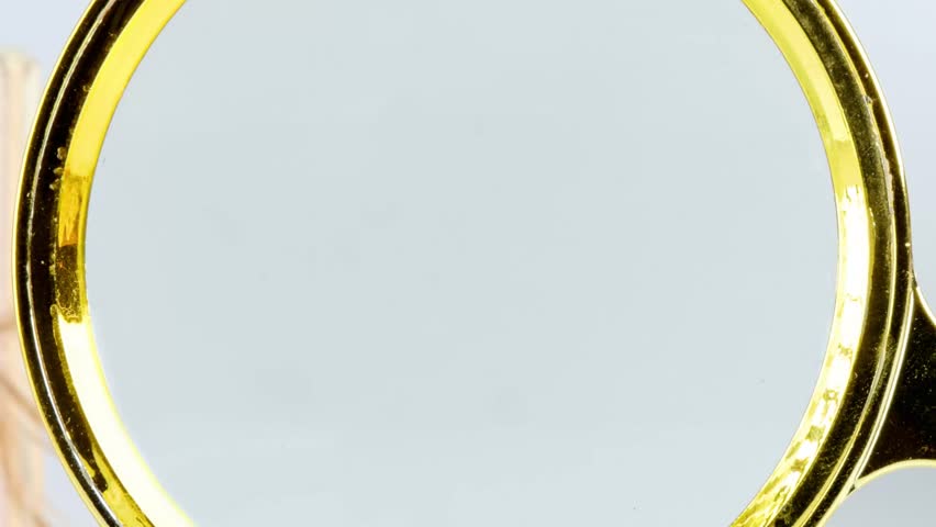 Magnifying glass reveals the words SELF MADE 2026 with a stack of money and a vibrant green plant in the background, showcasing financial aspirations