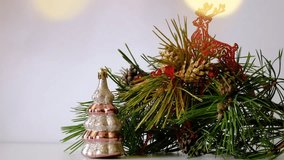 Christmas decorations. Silver, golden and red colors, natural branches of pine tree. Festively decorated Christmas tree branches. lens flares effect. White background. Happy New Year - Powered by Shutterstock - Get 15% off with code: PIKWIZARD15