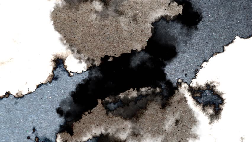 Ink bleeding and spreading on a coarse, textured cardboard surface, creating a unique, dark abstract background with organic edges