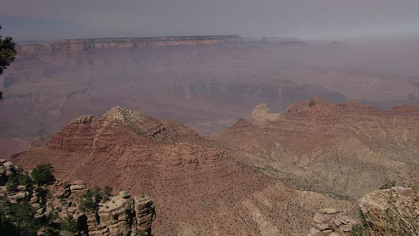 Zoom out from ridge to larger formation of the canyon