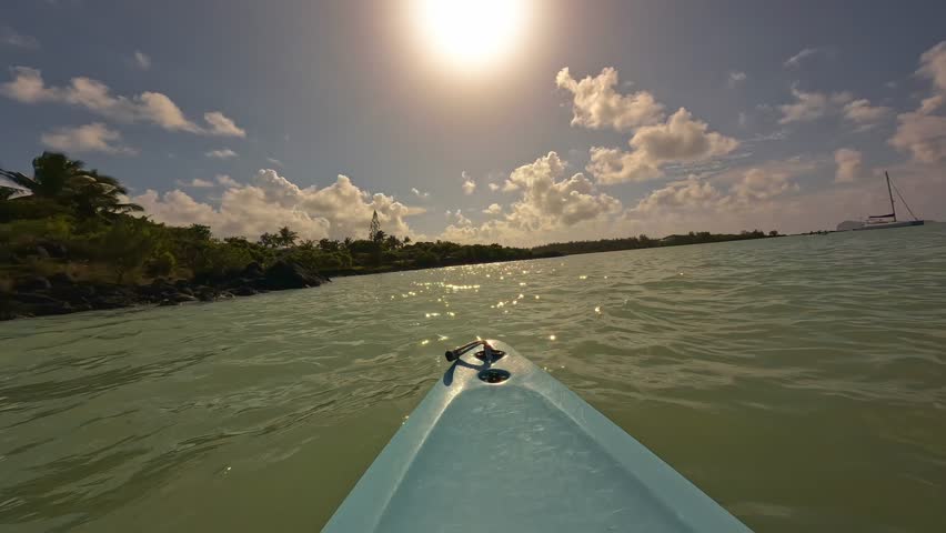 Experience serene nature on a boat and kayak at sunset
