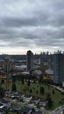 Vancouver City Skyline with High-Rise Buildings Overlooking a Park in Lower Mainland, British Columbia