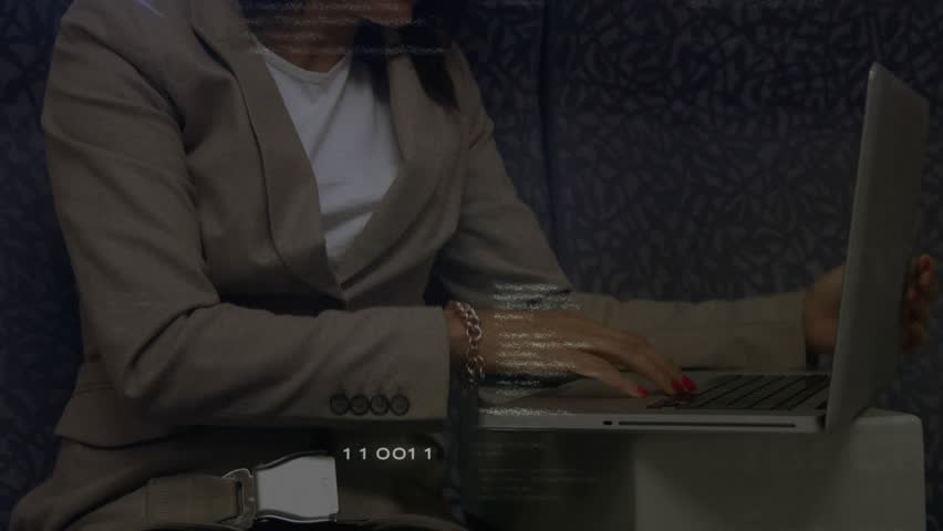 Opening laptop woman typing on plane working streaming IT code overlay intensifying obscuring hands. Technology, productivity, digital, professional, business, modern, innovation - Powered by Shutterstock - Get 15% off with code: PIKWIZARD15
