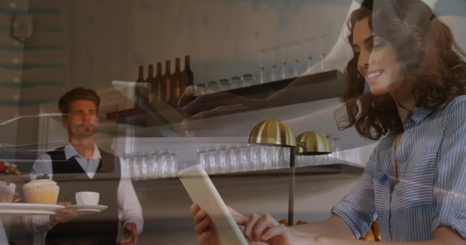 Customer tapping tablet at cafe, unveiling finance charts around waiter while monitoring portfolio. Technology, collaboration, metropolis, modern, communication, finance, startup
