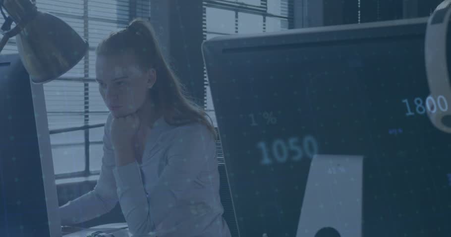 Woman analyzing finances with line graphs appearing while adjusting lamp and repositioning posture. Technology, data, analytics, finance, workplace, productivity, modern