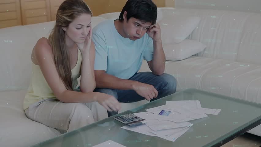 Couple reviewing bills, tapping calculator and counting cash while green charts tracking finances. Financial planning, household budgeting, teamwork, collaboration, data analysis, home environment - Powered by Shutterstock - Get 15% off with code: PIKWIZARD15