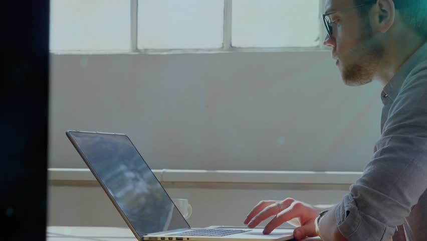 Office worker typing on laptop animating devices into user icons highlighting phone endpoint. Technology, connectivity, digital, workspace, modern, innovation, communication - Powered by Shutterstock - Get 15% off with code: PIKWIZARD15