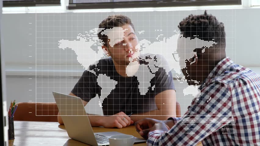 Two colleagues clicking laptop and discussing analytics while graph markers and map overlaying desk. Collaboration, teamwork, data analysis, business meeting, modern workspace, professional - Powered by Shutterstock - Get 15% off with code: PIKWIZARD15
