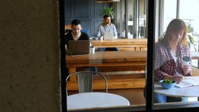 Woman glancing smartphone in cafe initiating animated line, area, bar charts driving data analysis. Collaboration, innovation, technology, modern, workspace, productivity, teamwork - Powered by Shutterstock - Get 15% off with code: PIKWIZARD15