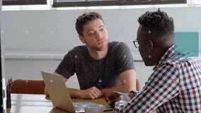 Colleagues gesturing at laptop sparking data overlay showing business analysis reaching agreement. Collaboration, teamwork, brainstorming, digital interface, professional, creative, innovation - Powered by Shutterstock - Get 15% off with code: PIKWIZARD15