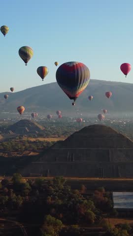 Sunrise on hot air balloon over the Teotihuacan pyramid