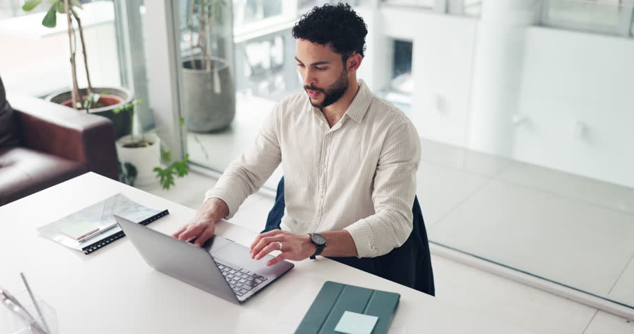 Business, relax and man in office, laptop and completed assignment with break, internet and success. Person, journalist and employee in workplace, computer and breathing with finished task or project