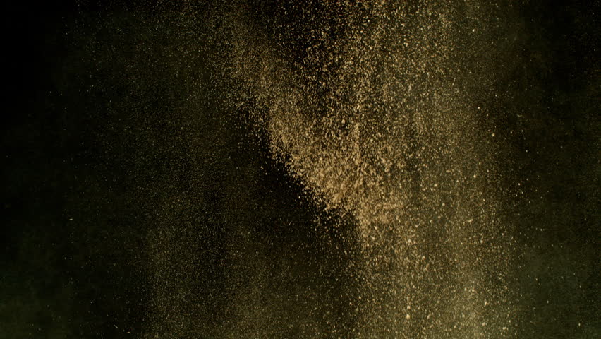 Super Slow Motion Shot of Flying Sand , Isolated on Black Background , Filmed on High Speed Cinematic Camera at 1000 FPS