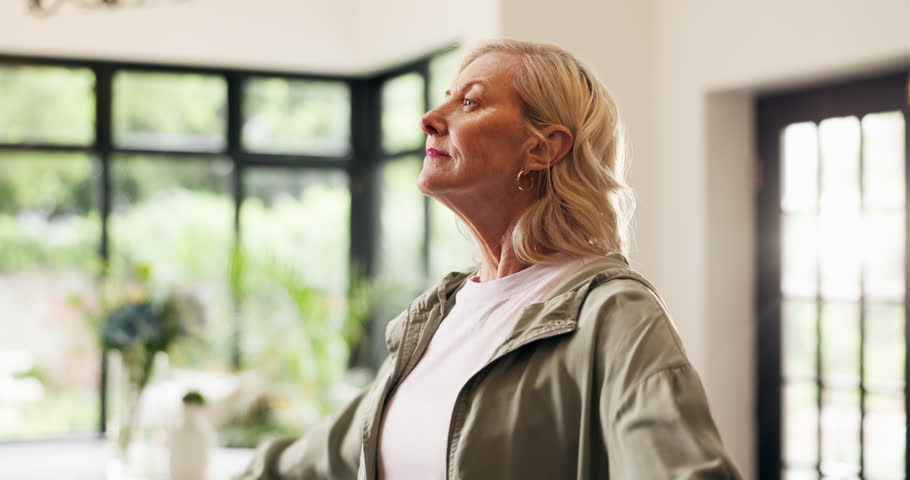 Dumbbells, fitness and thinking with senior woman in living room of home for training or workout. Exercise, vision and weightlifting with old person in apartment for health or wellness routine