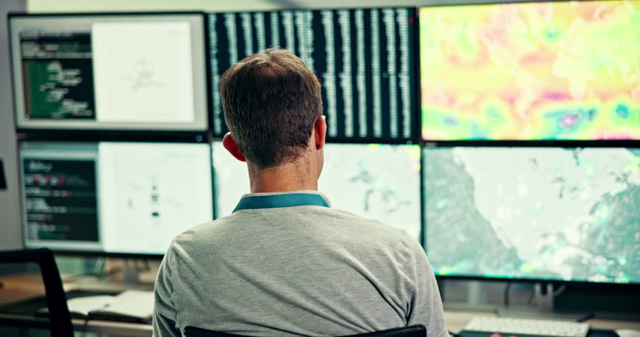 Computer screen, geology and thinking with man in weather control room for climate forecasting. Back, display and meteorology with thoughtful person in airport traffic tower for heat map monitoring
