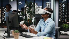 African american woman employs AI gadget with virtual reality in dark office, doing overtime at the corporation workspace with VR glasses to ensure fact checking and analyze projections. Camera B. - Powered by Shutterstock - Get 15% off with code: PIKWIZARD15