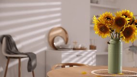 Beautiful sunflowers in can used as vase on dining table at home, camera moving right - Powered by Shutterstock - Get 15% off with code: PIKWIZARD15