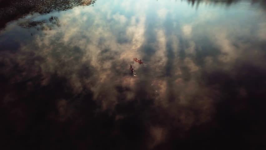 4K Aerial Drone Footage of Kayaks on Little Lava Lake with Mist at Sunrise and Mount Bachelor in Background, Oregon, USA