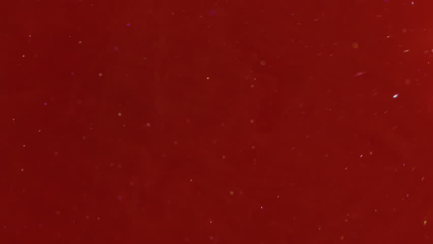 Spreading glitter. Paint swirl. Art sparkling particles water flow. Vibrant color emulsion explosion red orange abstract background. - Powered by Shutterstock - Get 15% off with code: PIKWIZARD15