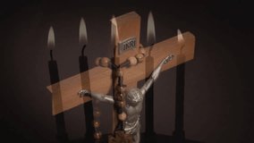 Composite video of burning candles against close up of a cross against grey background. Christianity and religion concept - Powered by Shutterstock - Get 15% off with code: PIKWIZARD15