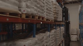 Freight transportation, distribution warehouses, industrial workersthe forklift truck is being used to move freight around in a warehouse. Global connections delivery transport and modern technology - Powered by Shutterstock - Get 15% off with code: PIKWIZARD15