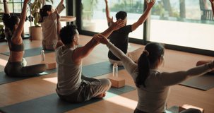Man, people and stretching for yoga in class, holistic fitness and spiritual balance for self care. Group, community and flexible with spinal twist pose, mindfulness and technique of wellness session - Powered by Shutterstock - Get 15% off with code: PIKWIZARD15