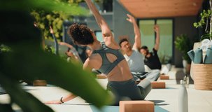 Fitness, outdoor and instructor with class for pilates workout with wellness, health and training. Calm, balcony and back of trainer with group of people for yoga exercise together with stretching. - Powered by Shutterstock - Get 15% off with code: PIKWIZARD15