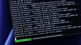 Dark computer screen showcases programming code, indicating software installation logs and data transfer activity, essential for IT infrastructure and cybersecurity operations - Powered by Shutterstock - Get 15% off with code: PIKWIZARD15