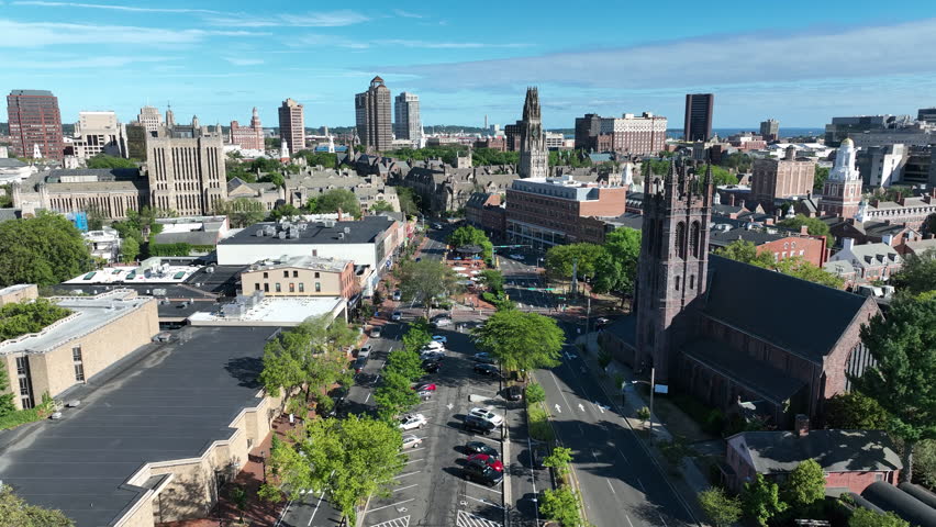 Flying Over The Street Along The Church And Yale University Campuses In New Haven, Connecticut, USA. - aerial shot