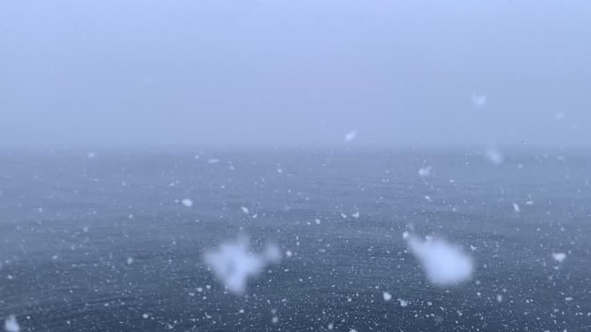 mp4 video showing snowfall at sea