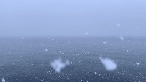 mp4 video showing snowfall at sea - Powered by Shutterstock - Get 15% off with code: PIKWIZARD15