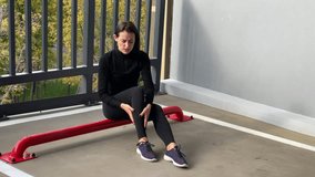 Injured female athlete sitting on ground holding painful ankle workout injury sport woman runner suffering sprain fitness training sportswoman feeling pain exercise medicine health problem in city - Powered by Shutterstock - Get 15% off with code: PIKWIZARD15