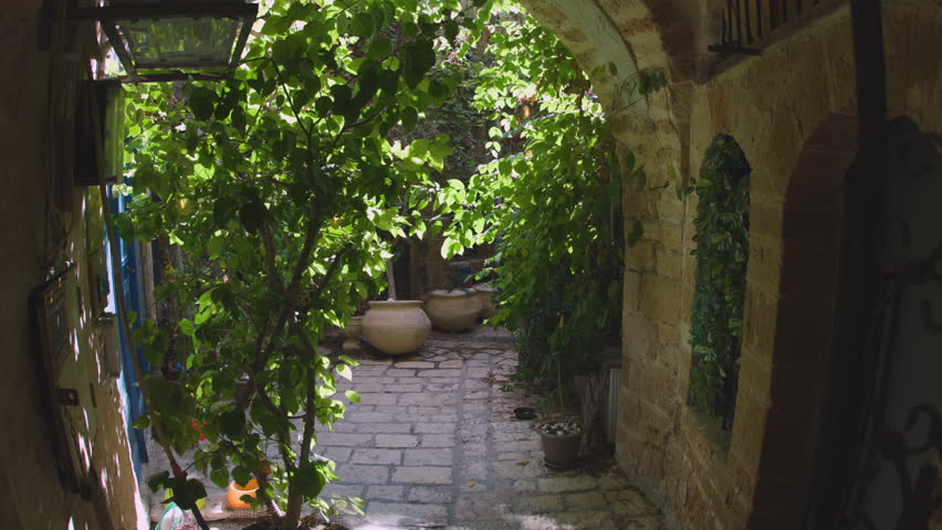 A stroll through the narrow streets of the old city of Jaffa in Israel. Traveling in Israel. Excursion to the Old City.