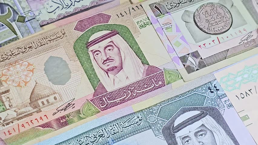 SAR Saudi Arabian riyals banknotes cash money bills, of different times, eras and values, from old vintage retro King Fahd times till king Salman time, Saudi Arabia riyals money and economy concept