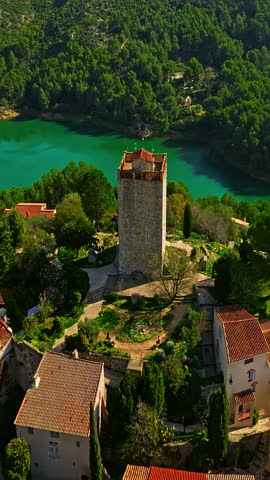  Le Revest-les-Eaux, France. The tower culminates at the top of the village. The small garden surrounding it, flourishing and well landscaped, offers a magnificent view