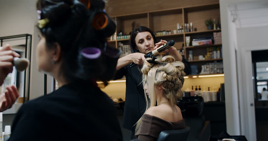 Experience Professional Hair Styling Performed in a Chic and Modern Salon Setting