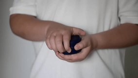 Child opening a blue box with removable dental braces inside. Close-up of hands showing orthodontic retainer case. Dental care and orthodontics concept.
 - Powered by Shutterstock - Get 15% off with code: PIKWIZARD15