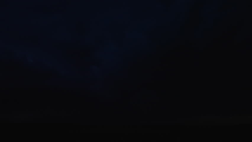 Lightning flashes within thunderstorm clouds, revealing dramatic motion, powerful energy, and the raw intensity of nature’s atmosphere in a cinematic night sky