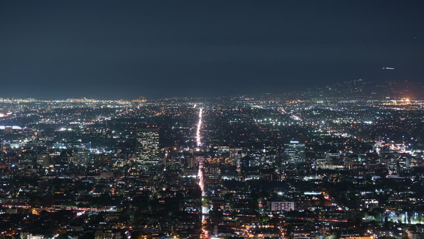 Los Angeles Night City Lights Telephoto from Griffith Park Time Lapse Tilt Down California USA