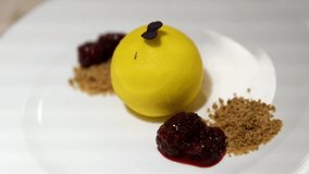 Gourmet dessert plated elegantly at fine dining restaurant, featuring square mousse cake with artistic garnishes, ideal for culinary and food presentation concepts. - Powered by Shutterstock - Get 15% off with code: PIKWIZARD15