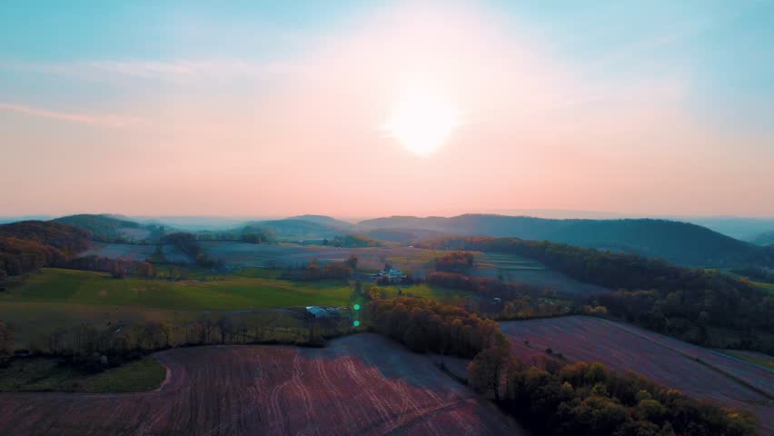 Aerial landscape of corn fields farmland mountains sunset rural Appalachia Central Pennsylvania USA