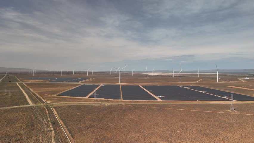Port Paterson, South Australia – 4K Aerial Drone Footage of Renewable Energy Sundrop Farm of Solar Panels, Wind Turbines, Desert Landscape, and Blue Coastal Horizon near Spencer Gulf, Augusta Highway