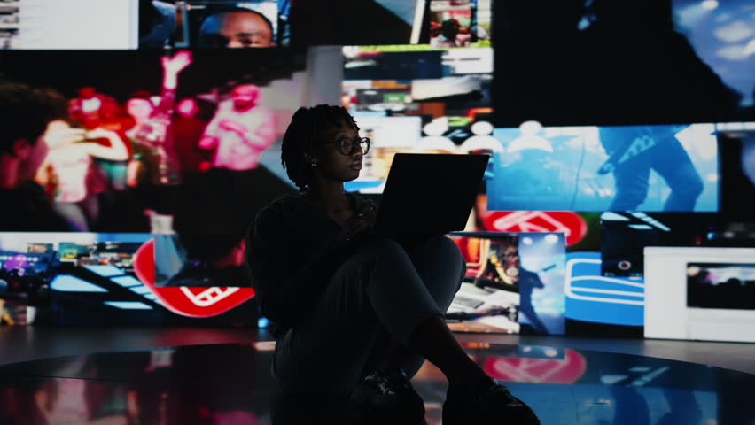 Teenager procrastinating online, browsing websites on laptop instead of doing school assignments. Lazy woman using notebook to have fun on internet instead of doing chores, camera A