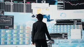 Manager evaluating business market graphs using tablet app, doing brainstorming. Businesswoman analyzing financial reports and data charts on digital device for business insights, camera A - Powered by Shutterstock - Get 15% off with code: PIKWIZARD15