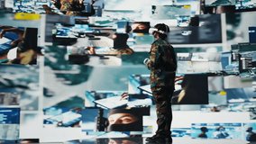 Military operator in war room oversees mission operations using virtual reality technology. Army soldier using VR headset equipment to do surveillance and threat monitoring, camera A - Powered by Shutterstock - Get 15% off with code: PIKWIZARD15