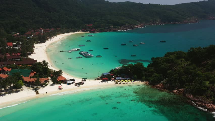 Aerial view of Long Beach on a sunny day on Redang Island in Malaysia. The most beautiful tropical beach on the island