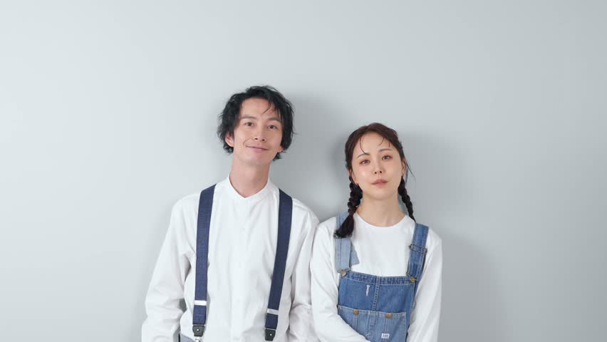 Couple photo of a man and woman wearing denim